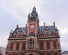 Old City Hall Of Borgerhout With Clock Tower In Flemish Neo Renaissance Style, Antwerp, Flanders, Belgium 
