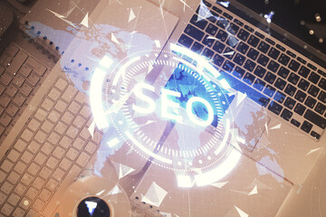 Aufkleber - Double exposure of SEO drawing over study table background with computer. Concept of search. Top view.