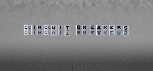 Wall Mural - circuit breakers word or concept represented by black and white letter cubes on a grey horizon background stretching to infinity