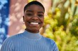 © Krakenimages.com - Young african american woman smiling happy standing at the city.