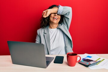 Sticker - Beautiful middle age woman working at the office drinking a cup of coffee smiling cheerful playing peek a boo with hands showing face. surprised and exited