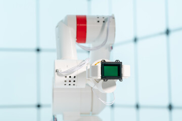 Sticker - Robot arm with CCD and CMOS matrix Image sensor in the manipulator. Concept on the topic of artificial vision and pattern recognition