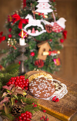 Sticker - Christmas decoration with cookies on an old wooden background.