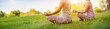 © candy1812 - Two women sitting in active wear in lotus position in nature.