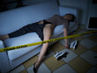 Crime Scene - Woman dead lying on the couch