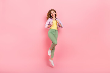 Sticker - Photo of confident charismatic healthy lady jump wear casual jacket trousers sneakers isolated pink color background