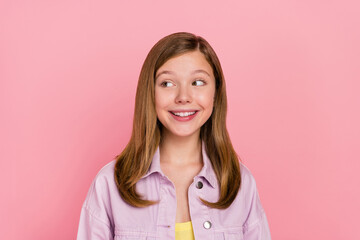 Sticker - Photo of young cheerful teen girl wonder look empty space dreamy minded isolated over pink color background