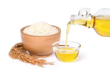Wall Mural - Rice bran oil extract with paddy and white rice on white background. 