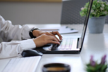 Poster - Businesswoman utilizing a digital tablet and an icon network connection data information with a growth graph, digital marketing, online banking and payment, business analysis and planning