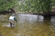 © Verbbaitum - An angler fishing on a river