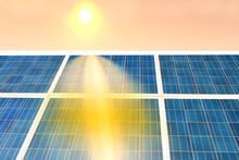 Solar Panels For Electricity Production Illuminated By Reflected Sun Rays