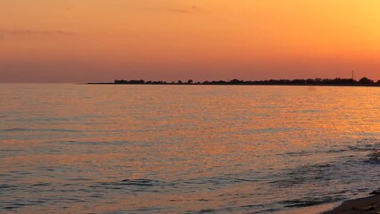 Canvas Print - Seascape timelapse with a beautiful sunset