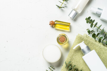Fototapete - Natural eucalyptus cosmetic, skincare product. Spa product at white table.
