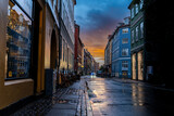 Fototapeta Uliczki - Beautiful sunset on a european narrow street in Copenhagen, Denmark 