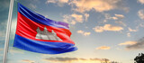 Fototapeta  - Cambodia national flag cloth fabric waving on the sky - Image