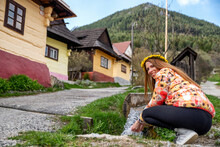 Pretty Face Girl Posing In Old Historical Village Vlkolinec At Slovakia