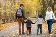 © pikselstock - Young family having fun outdoors