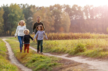 young family having fun outdoors