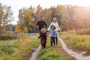 young family having fun outdoors