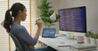 © ChayTee - Asia young business woman sit busy at home office desk work code on desktop PC reskill upskill for job career remote self test IT deep tech ai design skill online html text for cyber security.