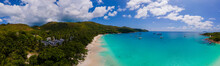 Praslin Seychelles Tropical Island With Withe Beaches And Palm Trees, Anse Lazio Beach,Palm Tree Stands Over Deserted Tropical Island Dream Beach In Anse Lazio, Seychelles. 