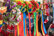 Variety of ethnic ukrainian traditional wreaths with flowers and ribbons - symbol of Ukrainian culture. Ethnic things at flea market or national festival