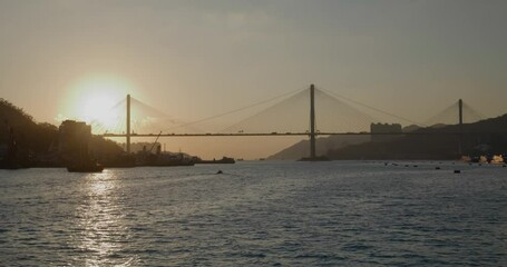 Fototapete - Beautiful sunset with Ting Kau bridge