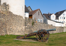 Historical Cannon In Front Of The Old City Wall Of Homberg Efze In Germany