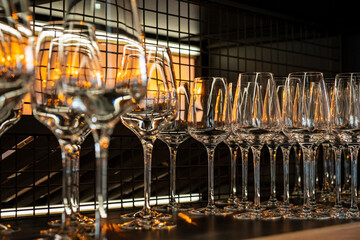 Poster - Different empty clean glasses on counter in bar