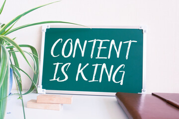 Wall Mural - CONTENT IS KING text on blackboard