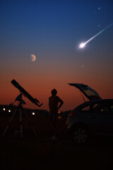 Wall Mural - silhouette of a man, car, telescope and countryside under the starry skies.