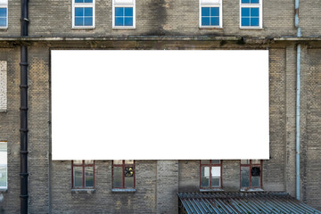 Poster - Blank white advertising billboard on the wall of old building