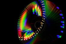 Reflection Of Light In A Compact Disk(CD) Or Digital Versatile Disk(DVD).