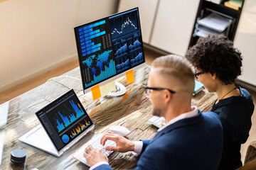 Poster - Two Stock Market Brokers Discussing Graphs On Computer