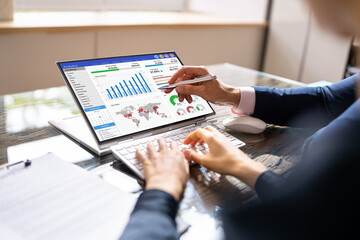 Poster - Financial Analyst Using Convertible Laptop Screen