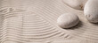 Round stones on the sand, zen, relaxation, texture, background, place for text