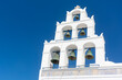Santorini bell tower of white church in Oia, Greece landmark