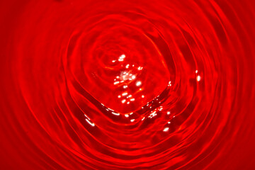 ripple red water, creative summer abstract background