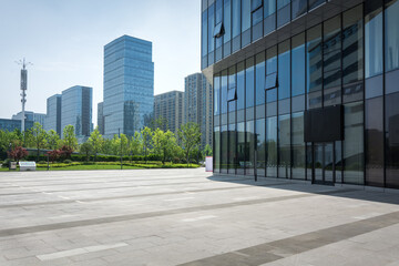 Canvas Print - Alley with office buildings in modern