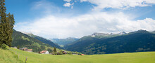 Alpine Landscape With Green Meadow, Tourist Resort Pany, Canton Grisons Switzerland
