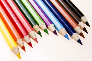 Wall Mural - Closeup of colorful pencils on a white background