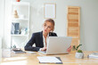 © artmim - Portrait of businesswoman doubting and planning in her workplace