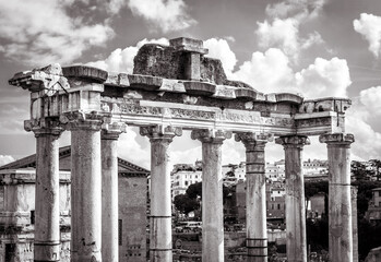 Wall Mural - Ancient Temple of Saturn in Roman Forum, Rome, Italy. Black and white photo.