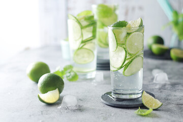 Wall Mural - Mineral water with lime and cucumber