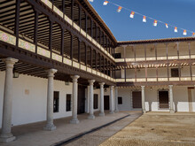 Main Square, Plaza Mayor, Of Tembleque. It Is A Picturesque Porticoed Square With Granite Columns And Two Floors Of Corridors With Wooden Pillars. Province Of Toledo, Castilla La Mancha, Spain.