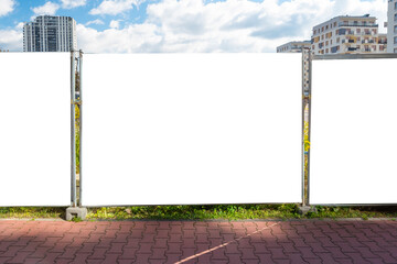 advertising banner mock-up on the fence of construction site in the city