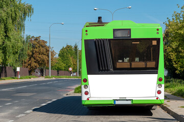 Poster - Modern green and white bus with blank white space for advertisement