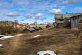Fototapeta  - Bolshaya Selga, Olonetsky district, Republic of Karelia, - April 28, 2022, an ancient Karelian village known since 1707. Wooden houses.