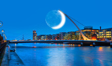 Samuel Backett Bridge (Harp Bridge) At Twilight Blue Hour With Crescent - River Liffey, Dublin  Ireland 