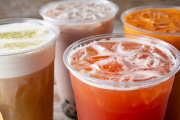 Wall Mural - A view of some cold fruit tea and milk tea beverages.